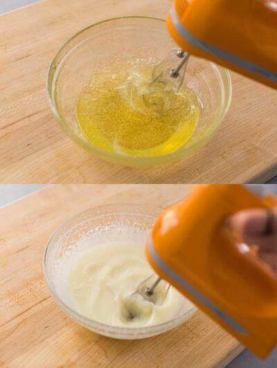 Sử dụng máy đánh trứng đánh bông hỗn hợp bơ và tinh dầu cho tới khi chuyển thành dạng kem sền sệt (Nguồn: Internet)